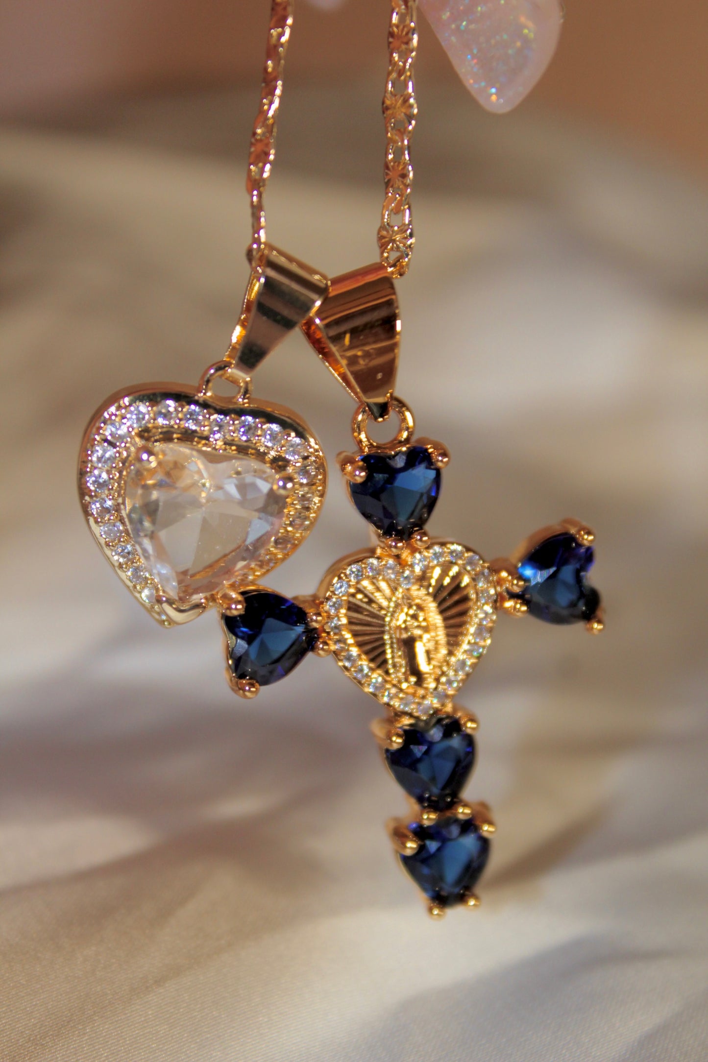 Dark Blue heart shaped cross with silver heart
