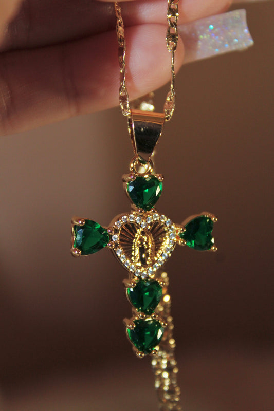 Green heart shaped cross