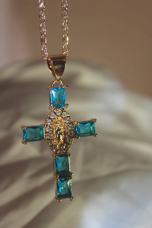 Blue cross with hearts in center