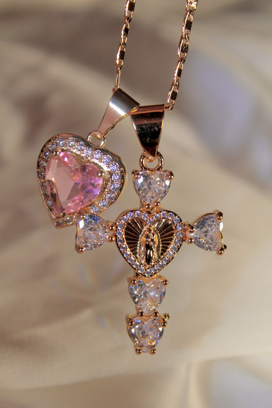 Silver Heart shaped cross with pink heart